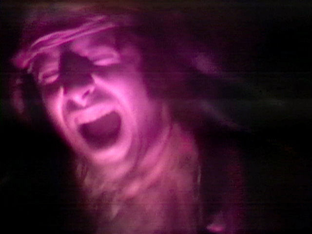 Still from “Dark Into Dark” by Charlemagne Palestine.